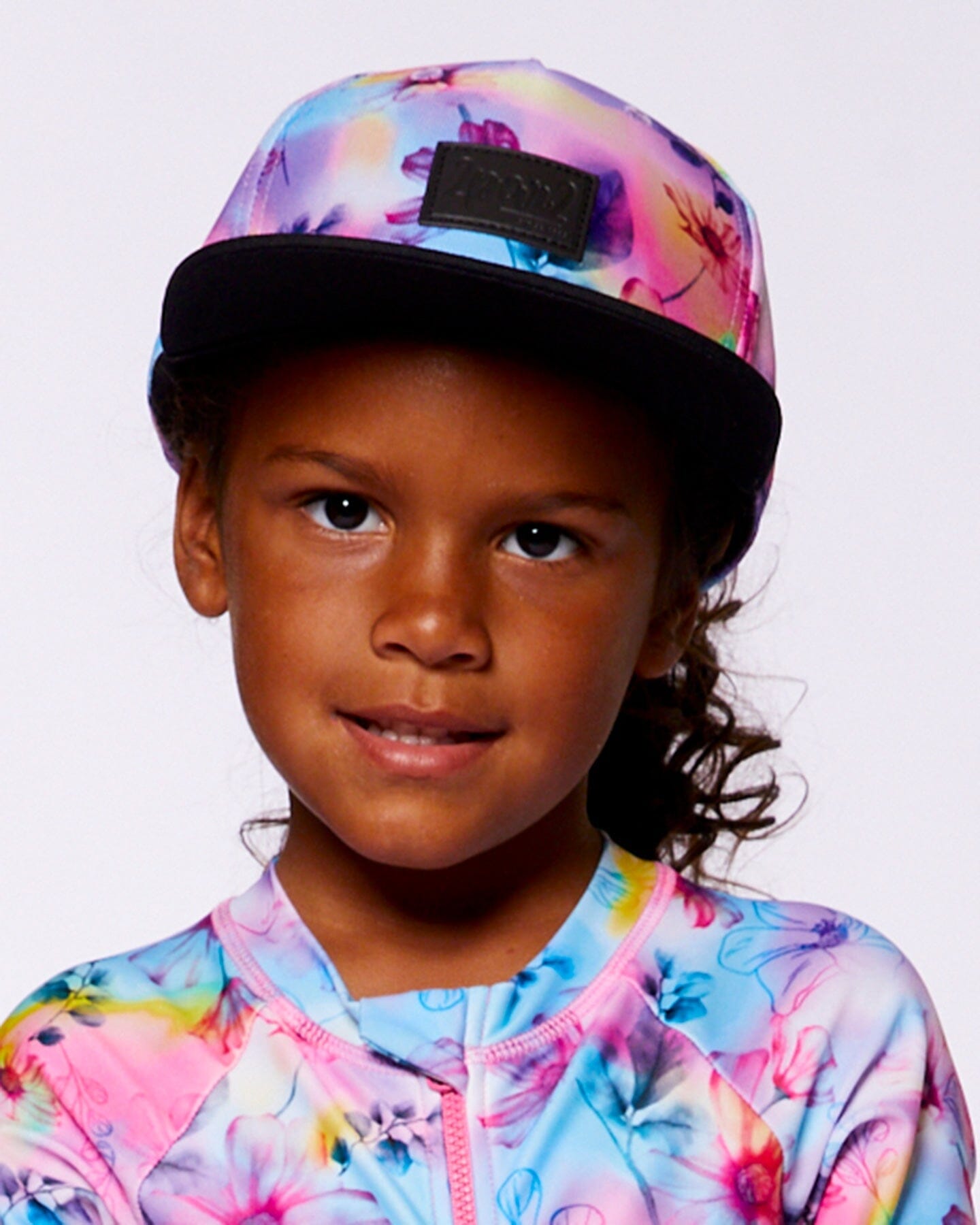 Printed Cap with Floral Print on Black and Multicolored Background